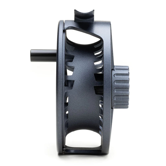 Fly fishing reel side view with dark gray frame and ridged adjustment dial