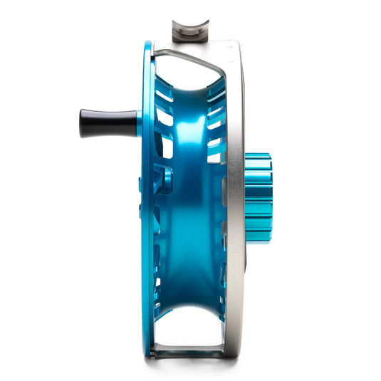 Fishing reel side view, blue spool housing with silver outer frame and handle grip