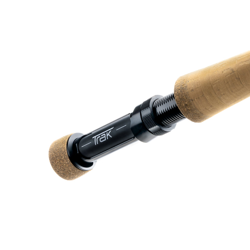 Load image into Gallery viewer, Fishing rod reel seat closeup with cork grip and black TRAX label
