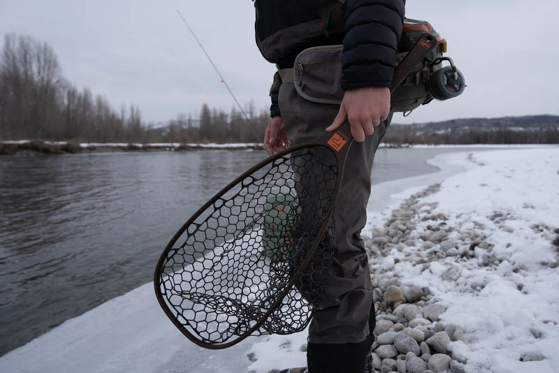 Load image into Gallery viewer, Landing net held outdoors, dark hex-mesh bag with brown handle
