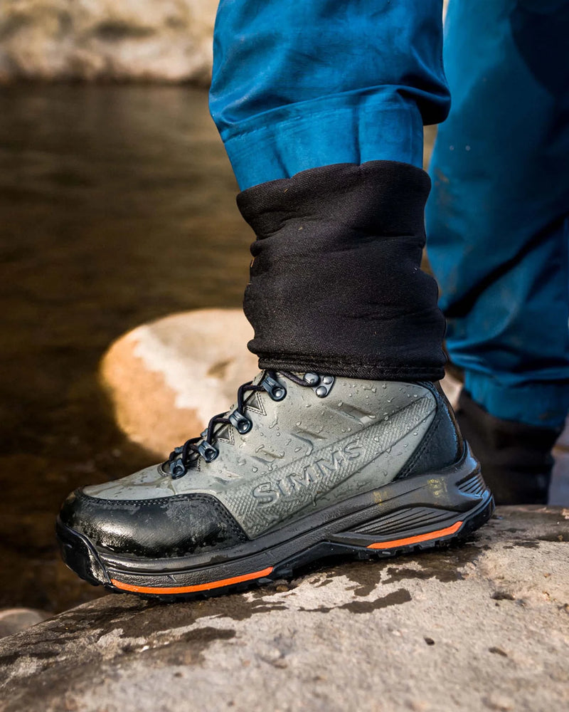 Load image into Gallery viewer, Men's felt boot, dark gray with orange trim and black rubber sole.
