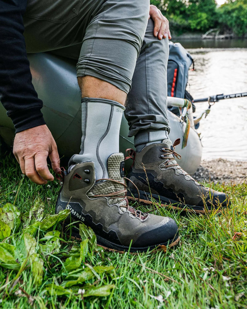 Load image into Gallery viewer, Neoprene wading socks worn with boots, light gray socks with dark trim
