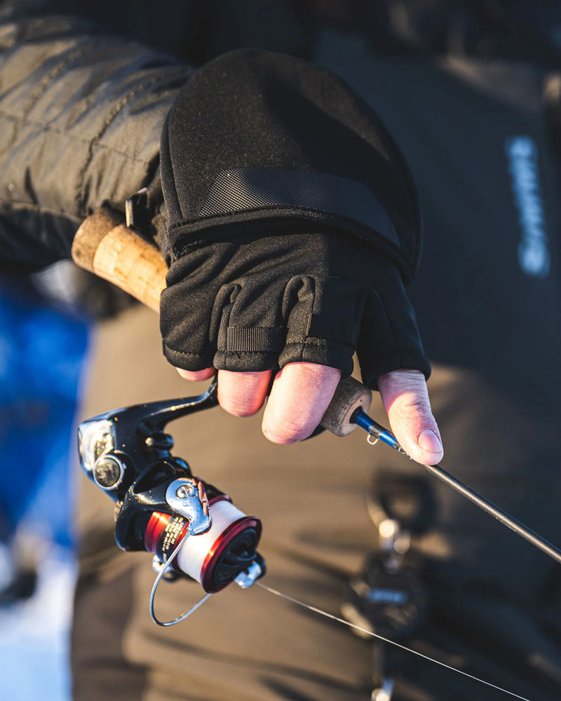 Load image into Gallery viewer, Simms Windstopper foldover mitt on hand, black with foldover cuff
