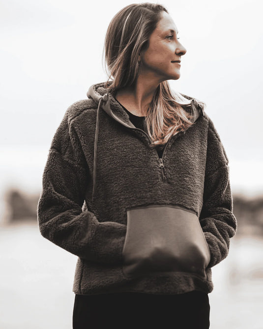 Women’s fleece hoodie worn on model, with hood and kangaroo pocket
