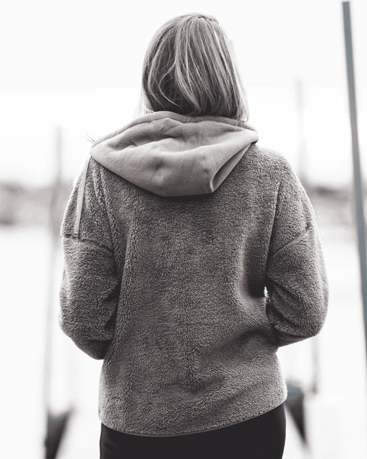Women’s fleece hoodie back view with hood and drawstring ties