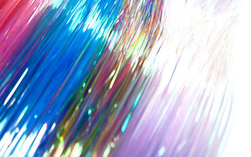 Load image into Gallery viewer, Iridescent glossy pearl fringe strands close-up with blue, purple, and green sheen
