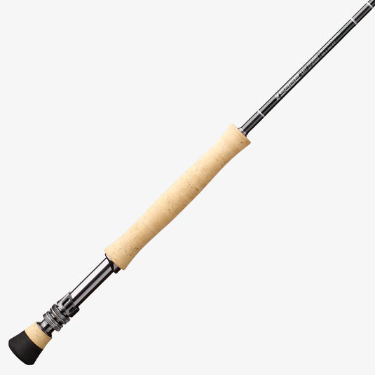 Fishing rod with cork grip and black hardware, angled close-up