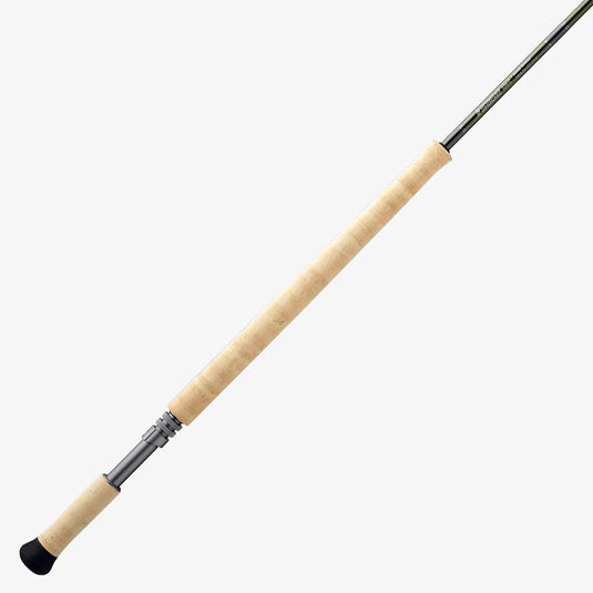 Fishing rod cork grip with black joint section near the handle, close-up