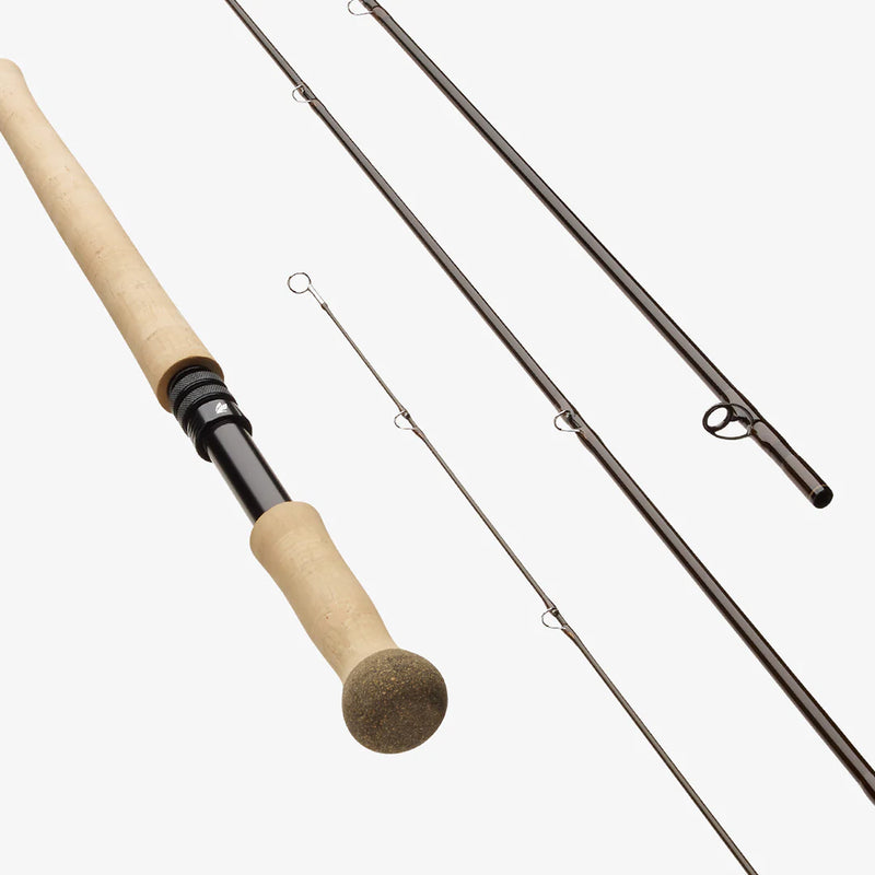 Load image into Gallery viewer, Spey fishing rods with cork handles and line guides on dark rod blanks.
