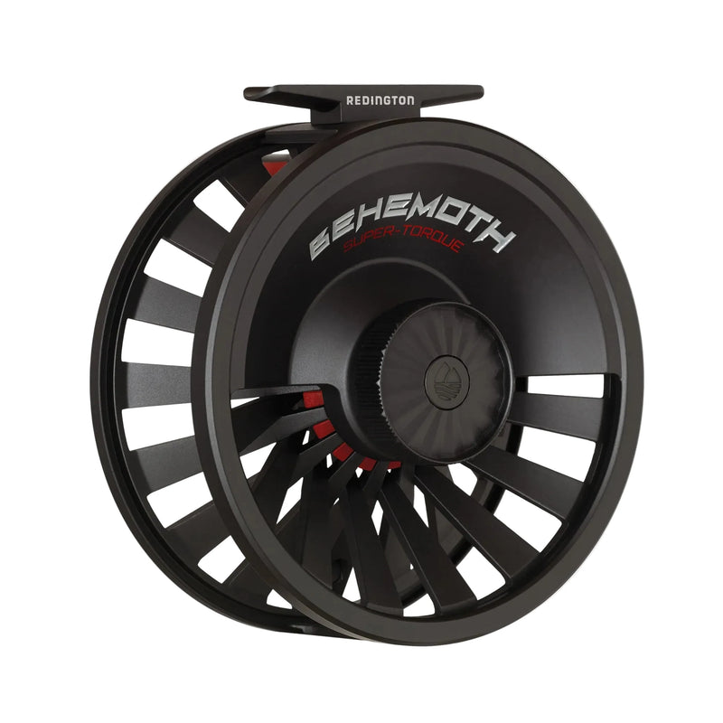 Load image into Gallery viewer, Black fly reel with large perforated spool and Redington branding
