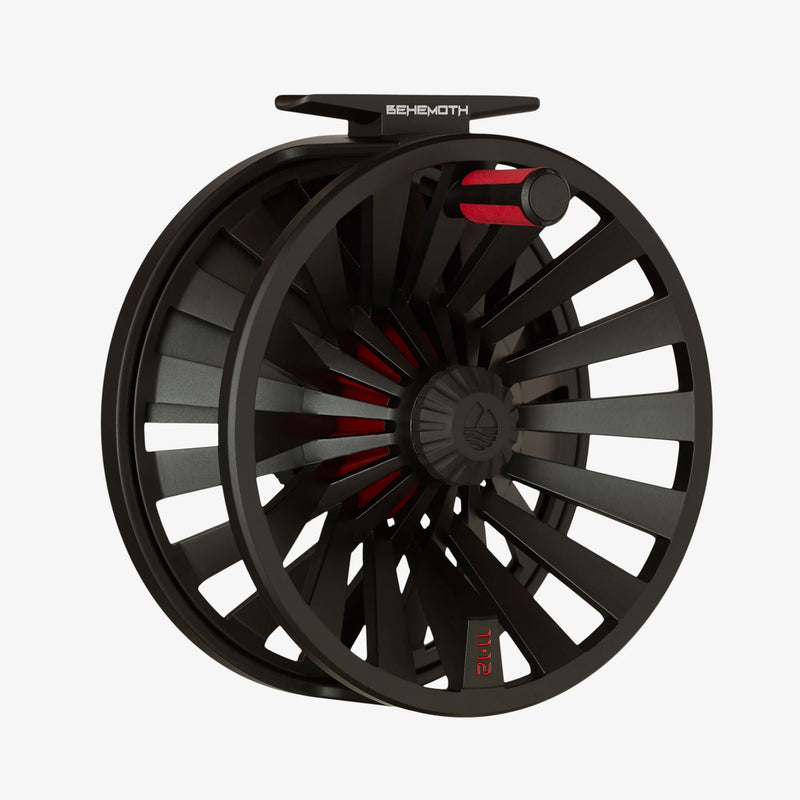 Load image into Gallery viewer, Black fly reel with red interior accents and perforated spoke design
