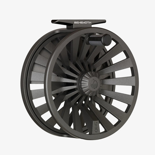 Gunmetal grey fly reel with arched handle and perforated spoke design