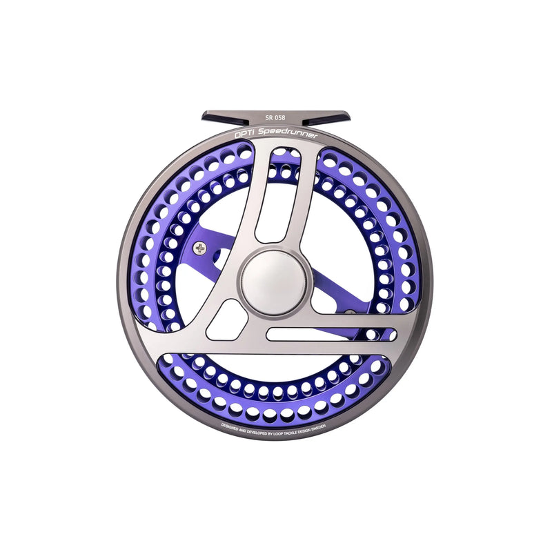 Load image into Gallery viewer, Fishing reel overhead view with purple ring, silver arms, and perforated reel face
