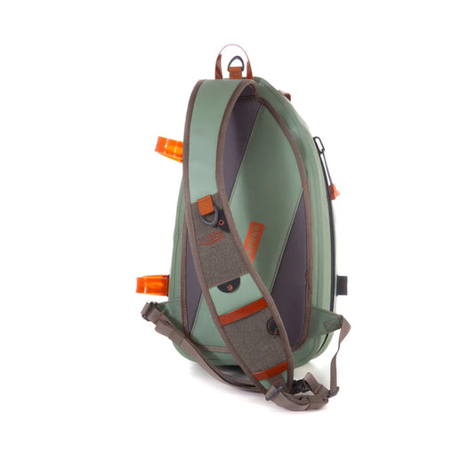 Submersible sling bag in olive green with gray backing panel and orange adjustment tabs