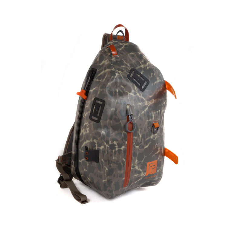 Load image into Gallery viewer, Submersible sling bag with dark camo print and orange webbing and zipper pull
