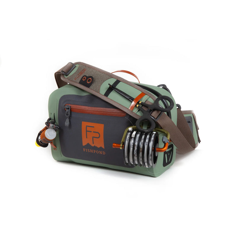 Load image into Gallery viewer, Olive green lumbar submersible pack with side-mounted gear holder and brown shoulder strap
