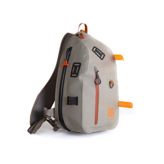 Submersible sling bag in light gray with orange webbing and side release straps
