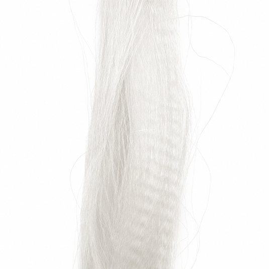 White fly-fishing hair strands, close-up view