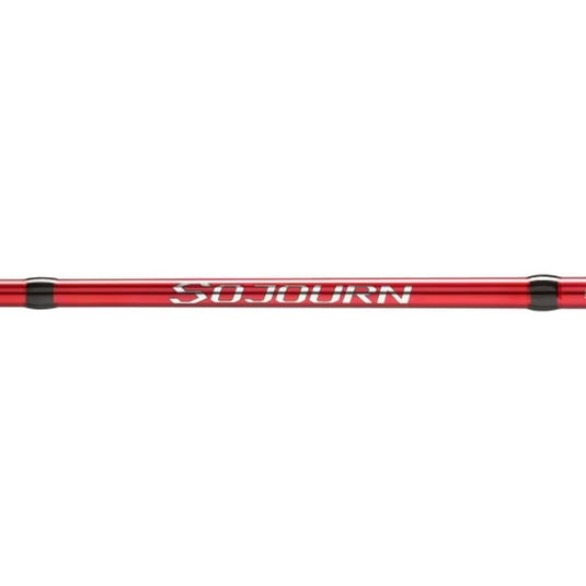 Shimano Sojourn fishing rod with red shaft and white branding text