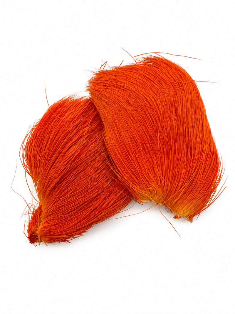 Load image into Gallery viewer, Deer hair tuft, bright orange, long flowing fibers
