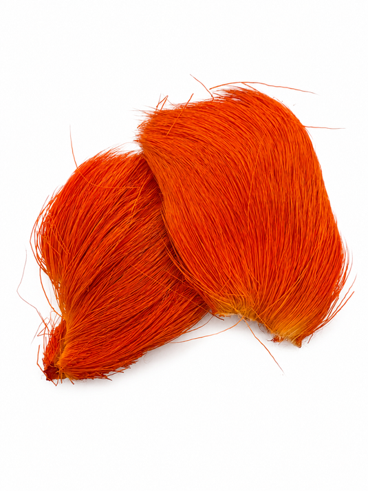 Deer hair tuft, bright orange, long flowing fibers