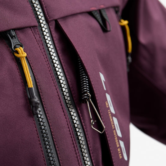 Dark purple wading jacket close-up of dual zippers with metal pulls