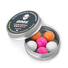 Strike indicator set in round metal tin, with multicolor buoyant markers