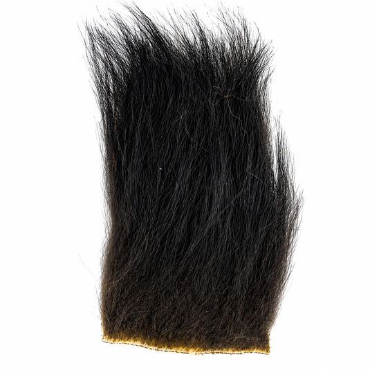 Black bear fur strip with dense, upright fibers and soft, straight edge