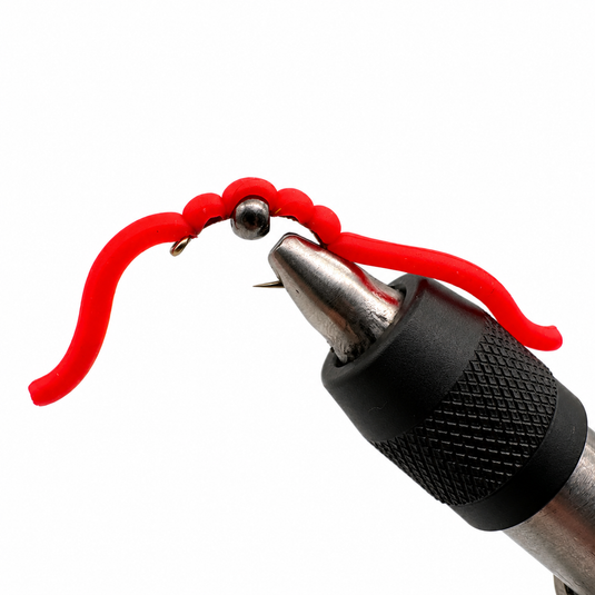 Red squirmy worm fishing lure with silver hook and black foam jig head