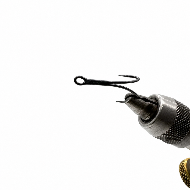 Load image into Gallery viewer, Barbed fishing hook attached to metal needle tool
