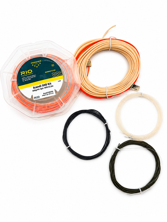 Fly fishing line kit with orange and tan loops, plus black lines in clear case