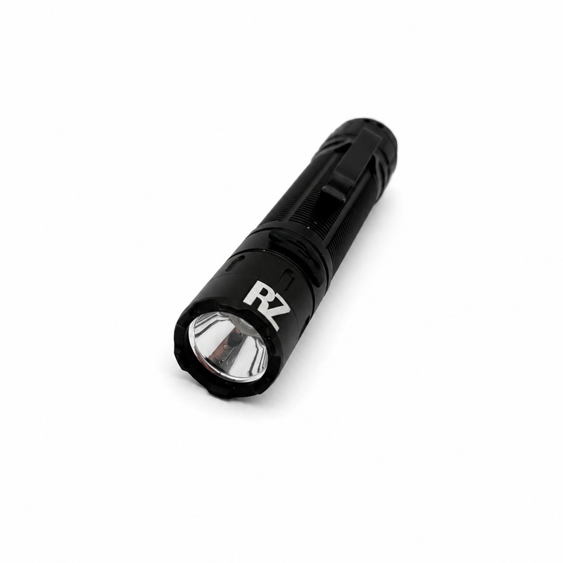 Load image into Gallery viewer, Black UV flashlight with front lens and knurled body, compact handheld design
