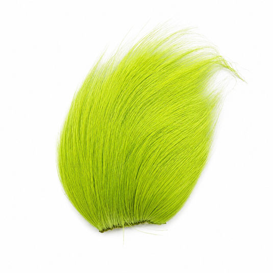 Chartreuse green deer body hair tuft with compact teardrop shape