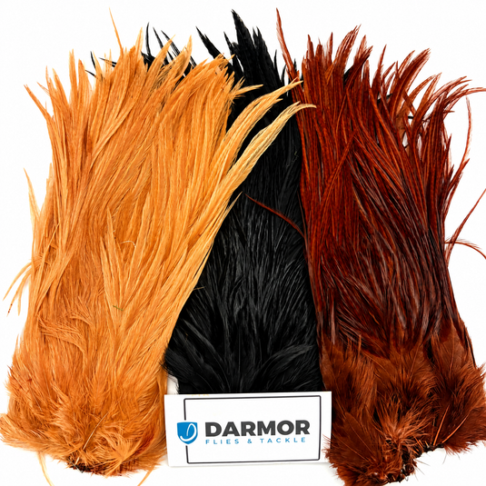 Colorful feather saddle with orange, brown, and black tufted fibers