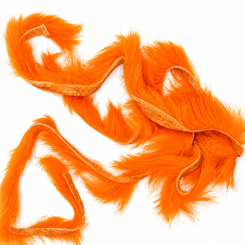 Load image into Gallery viewer, Orange rabbit fur strips with loose curled ends
