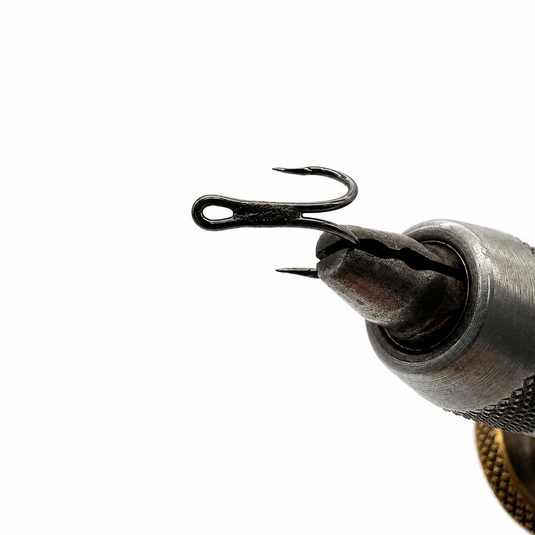LOOP double tube fly hook close-up held in tool, two barbed points