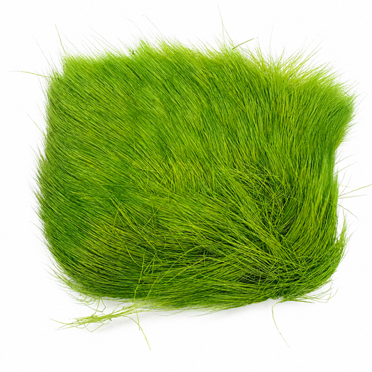 Green deer body hair tuft with compact teardrop shape