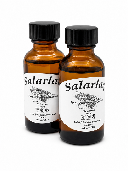 Salarlaq head cement bottles, amber liquid with black ribbed caps
