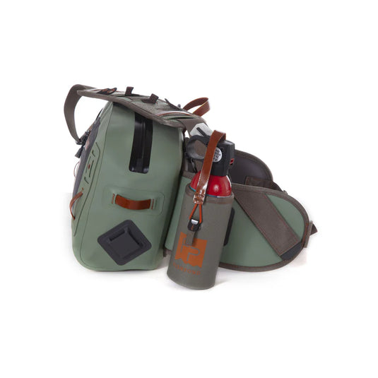 Green submersible lumbar pack with front pouch, bottle holder, and shoulder strap.