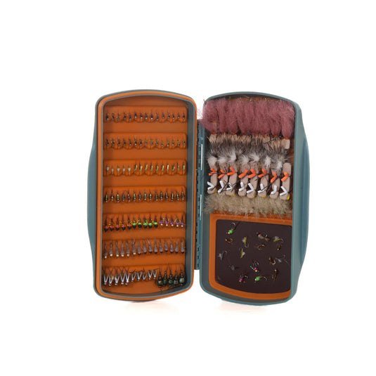 Fly fishing lure storage case with teal shell, orange insert, and hook compartments