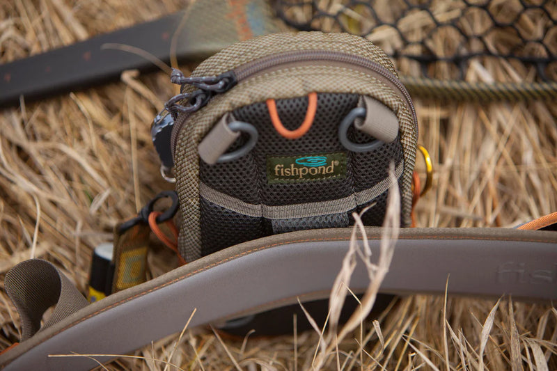 Load image into Gallery viewer, Fishpond San Juan vertical chest pack with fishpond logo, brown mesh front pouch and cords
