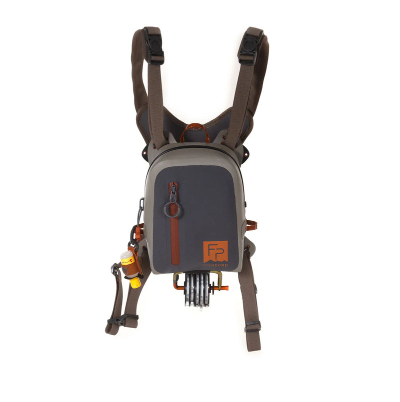 Load image into Gallery viewer, Submersible chest pack in dark gray with orange accents, front pocket and straps
