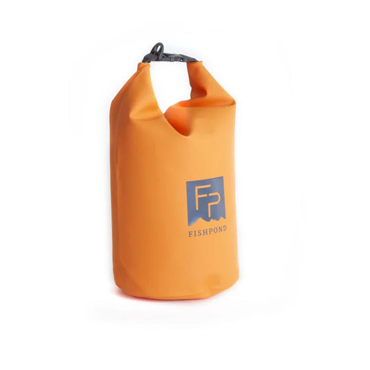 Orange roll-top dry bag with Fishpond logo patch