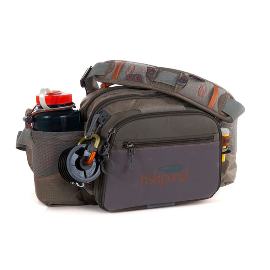 Fishing guide pack with gray waist pouch, fishpond logo, multiple zip pockets
